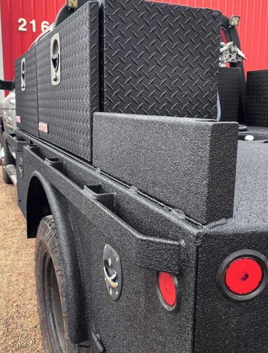 black bedliner utility truck